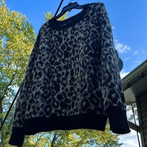 A cross between a cheetah and cougar print sweater. 🤷‍♀️